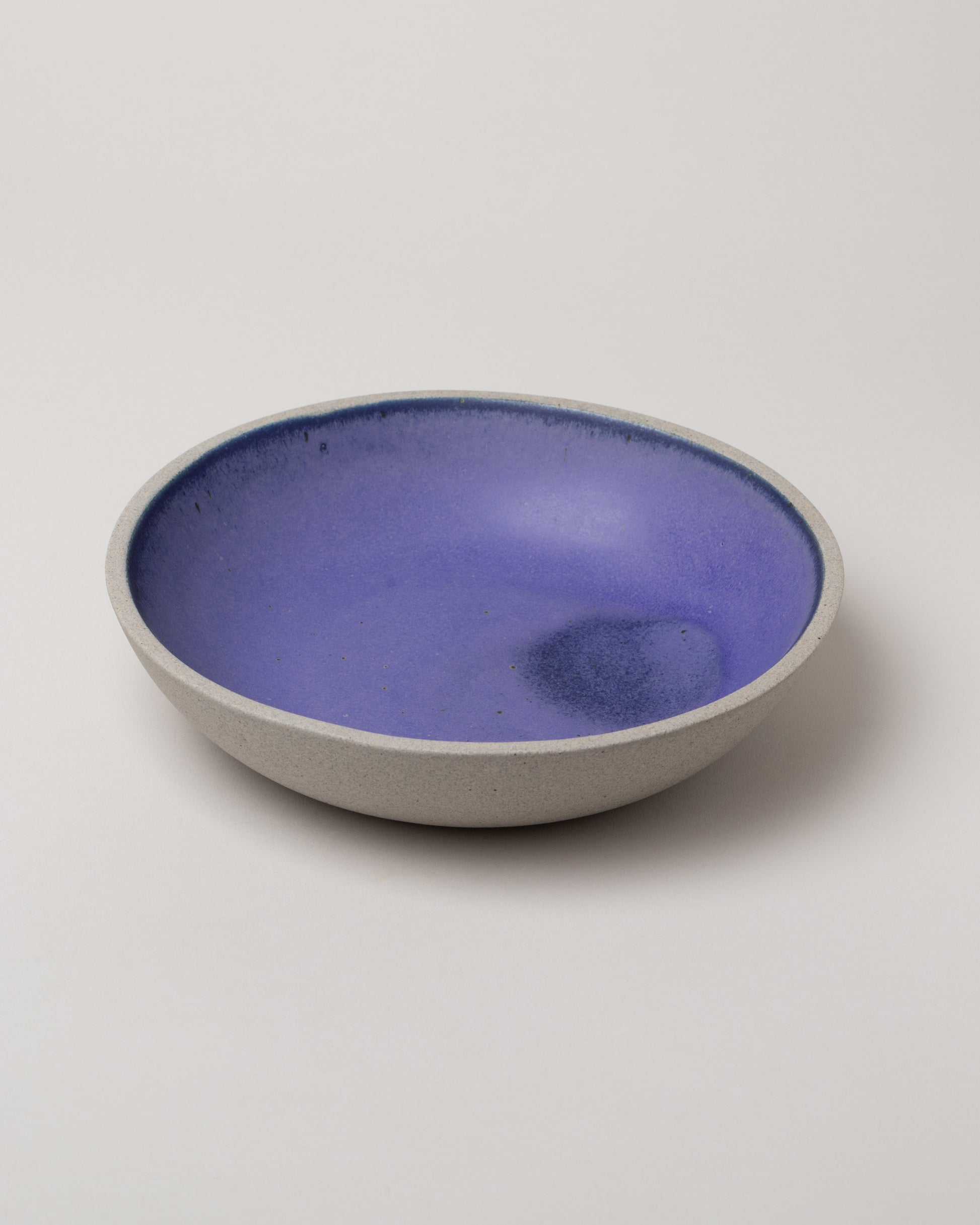 Humble Ceramics Greystone & Indigo Stillness Bowl on light color background.