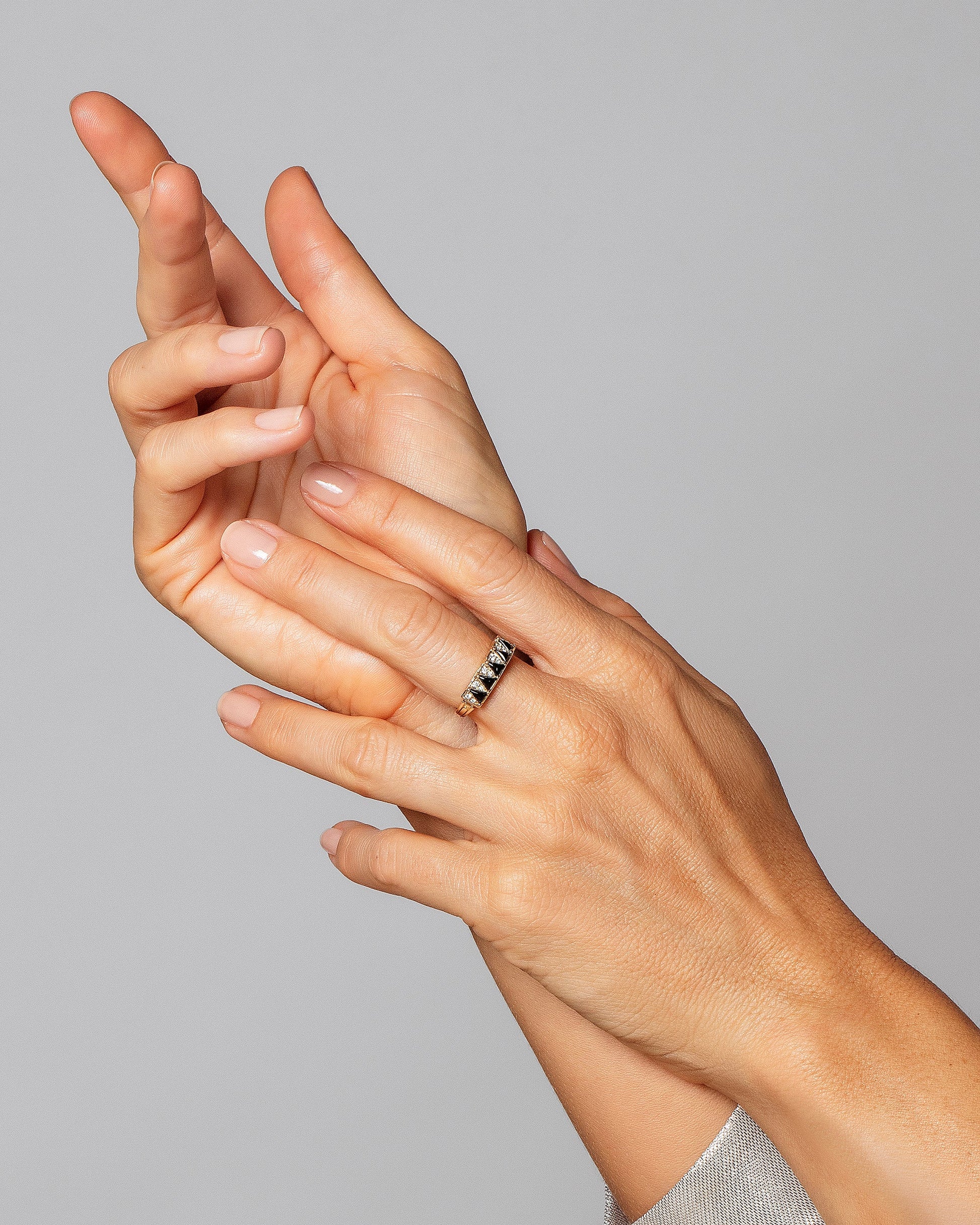 Gold Black Spinel Five Triangle Ring on model.