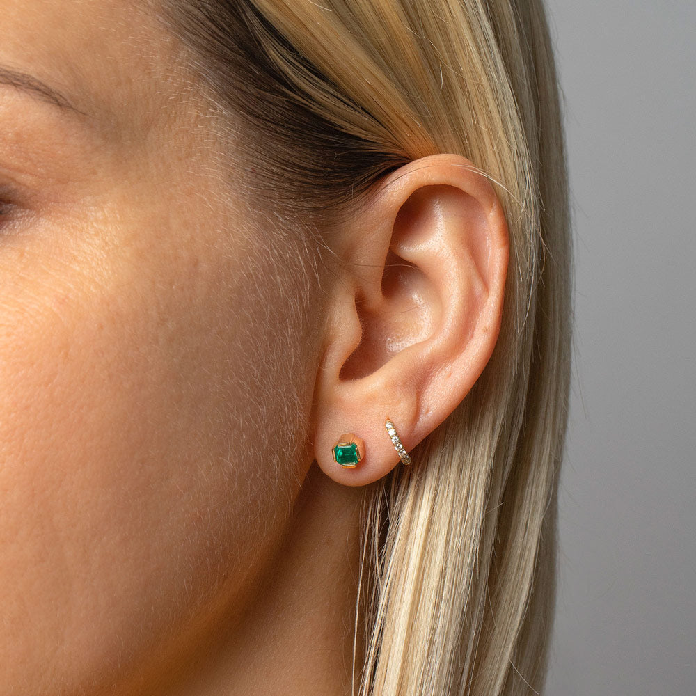product_details::Emerald Fold Earrings on model.