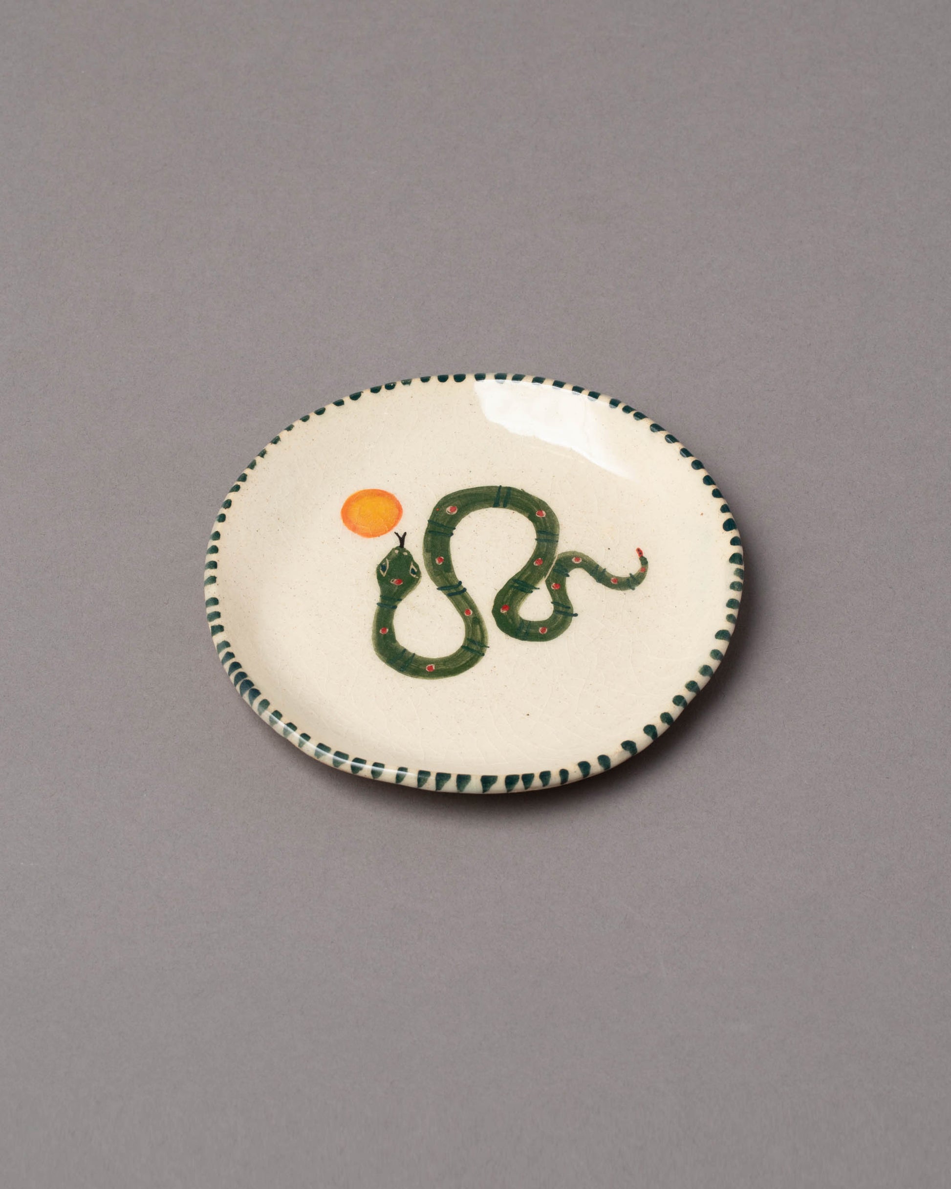 Fernanda Uribe-Horta Four Small Snake Dish on light color background.