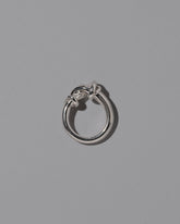 View from the side of the CRZM Sterling Silver Ridge Ring on light color background.