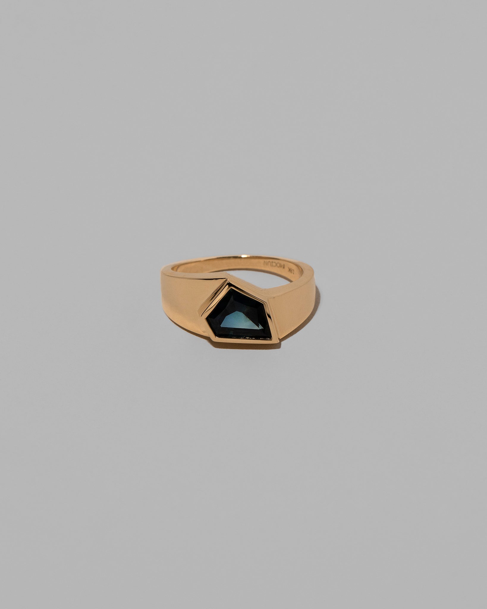 Gracious Ring on light color background.
