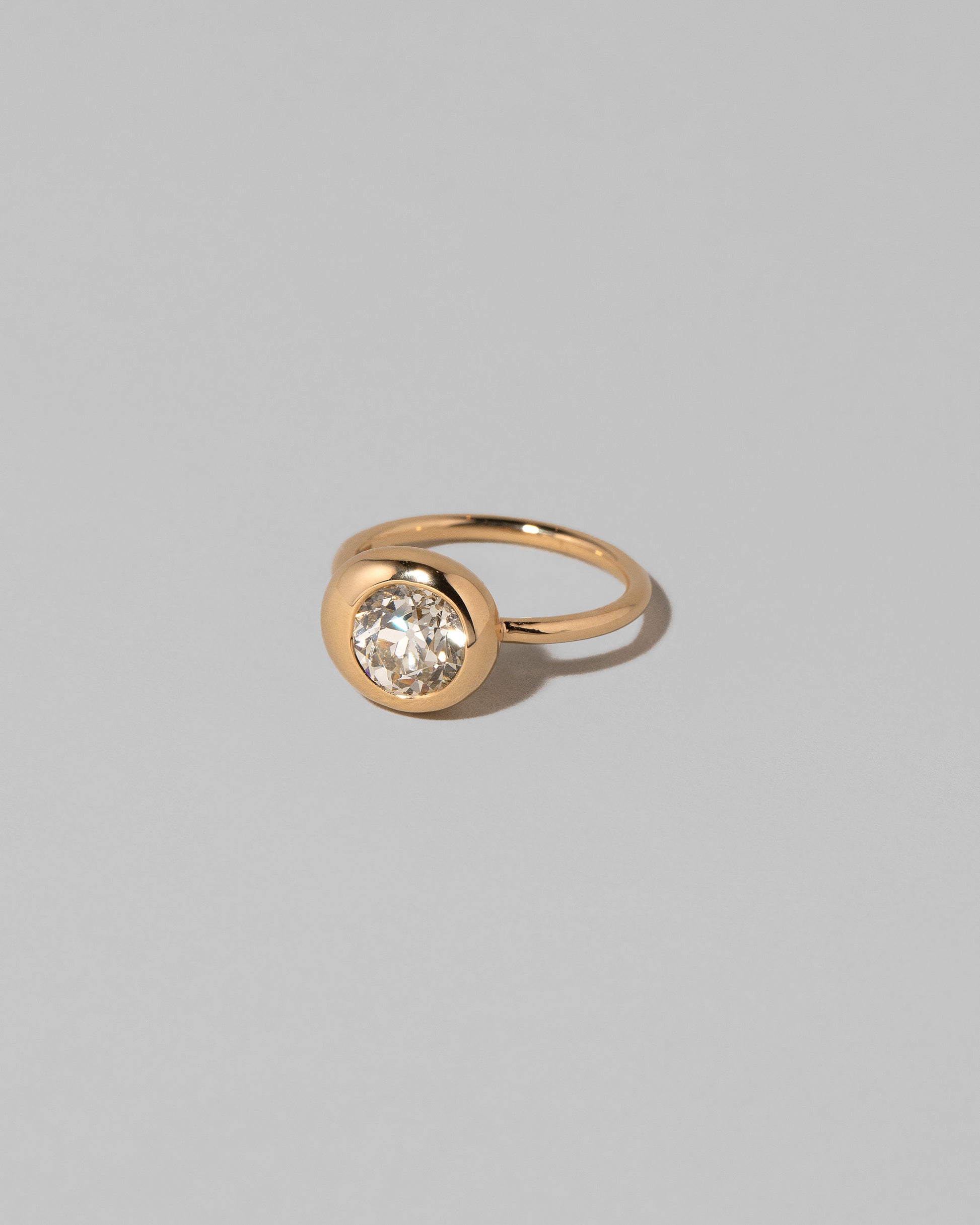 View of the Diamond Grand Level Ring on light color background.