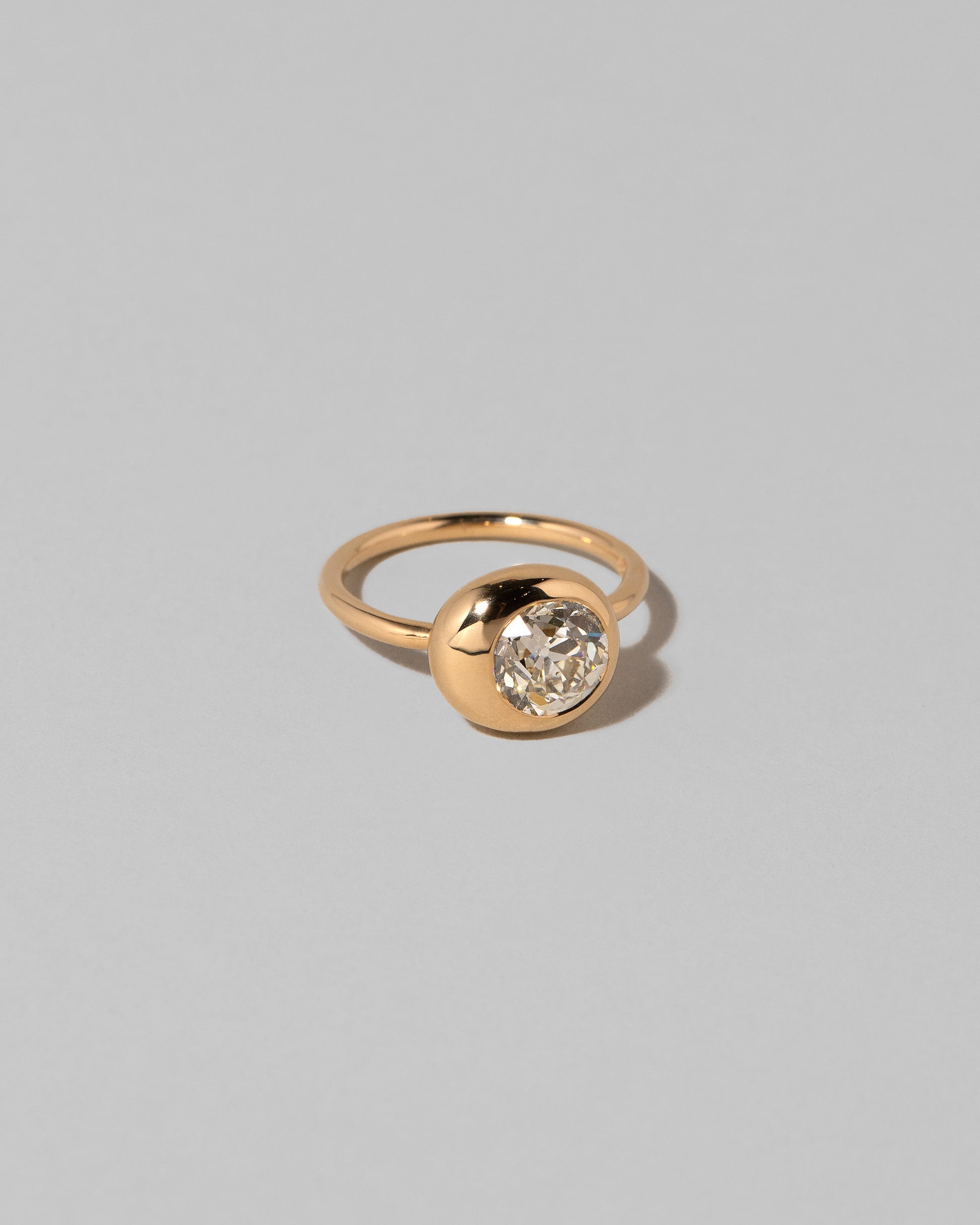 View of the Diamond Grand Level Ring on light color background.