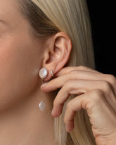 Plover Pearl Earrings on model.