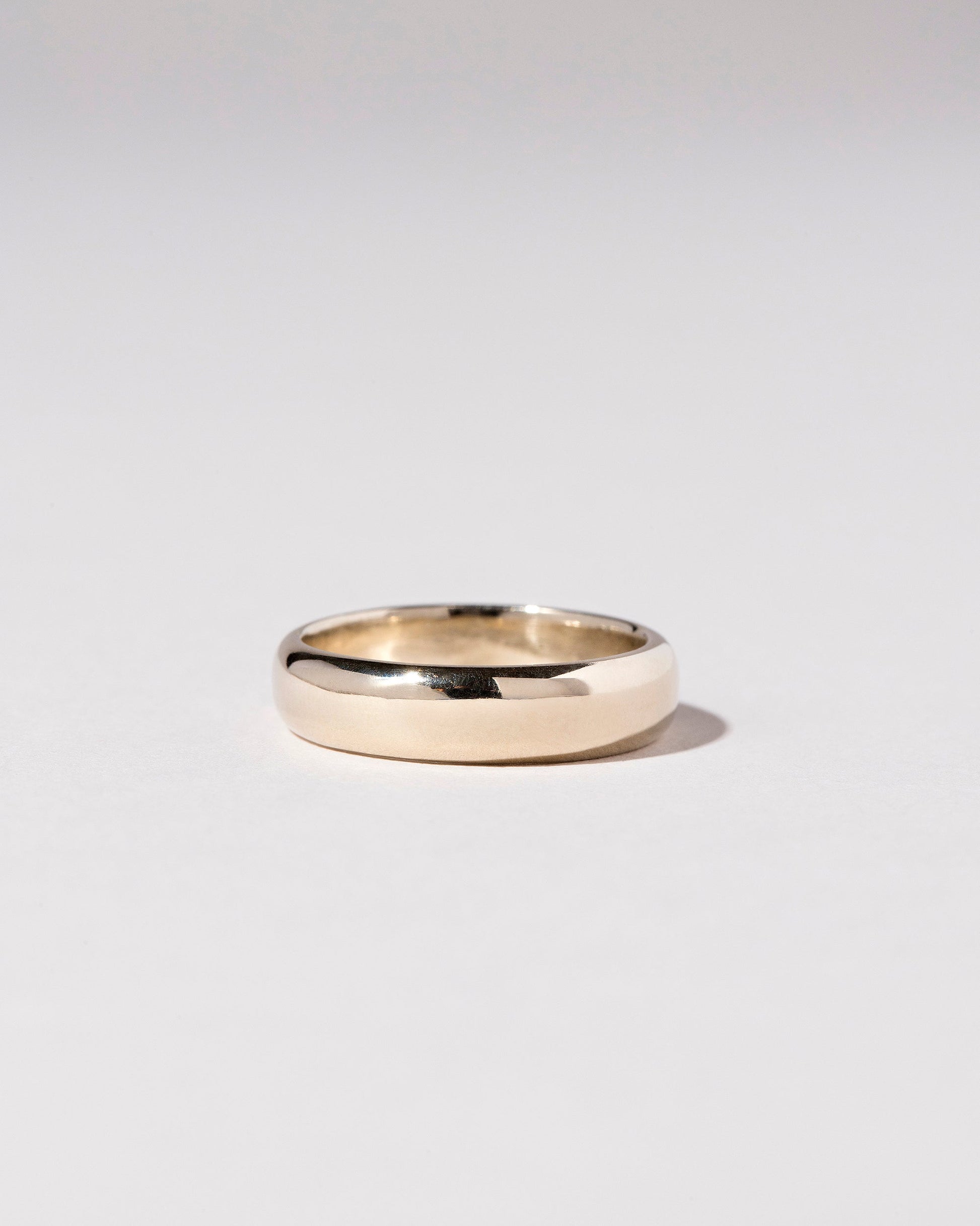 Gold 5mm Half Round Band on light color background.