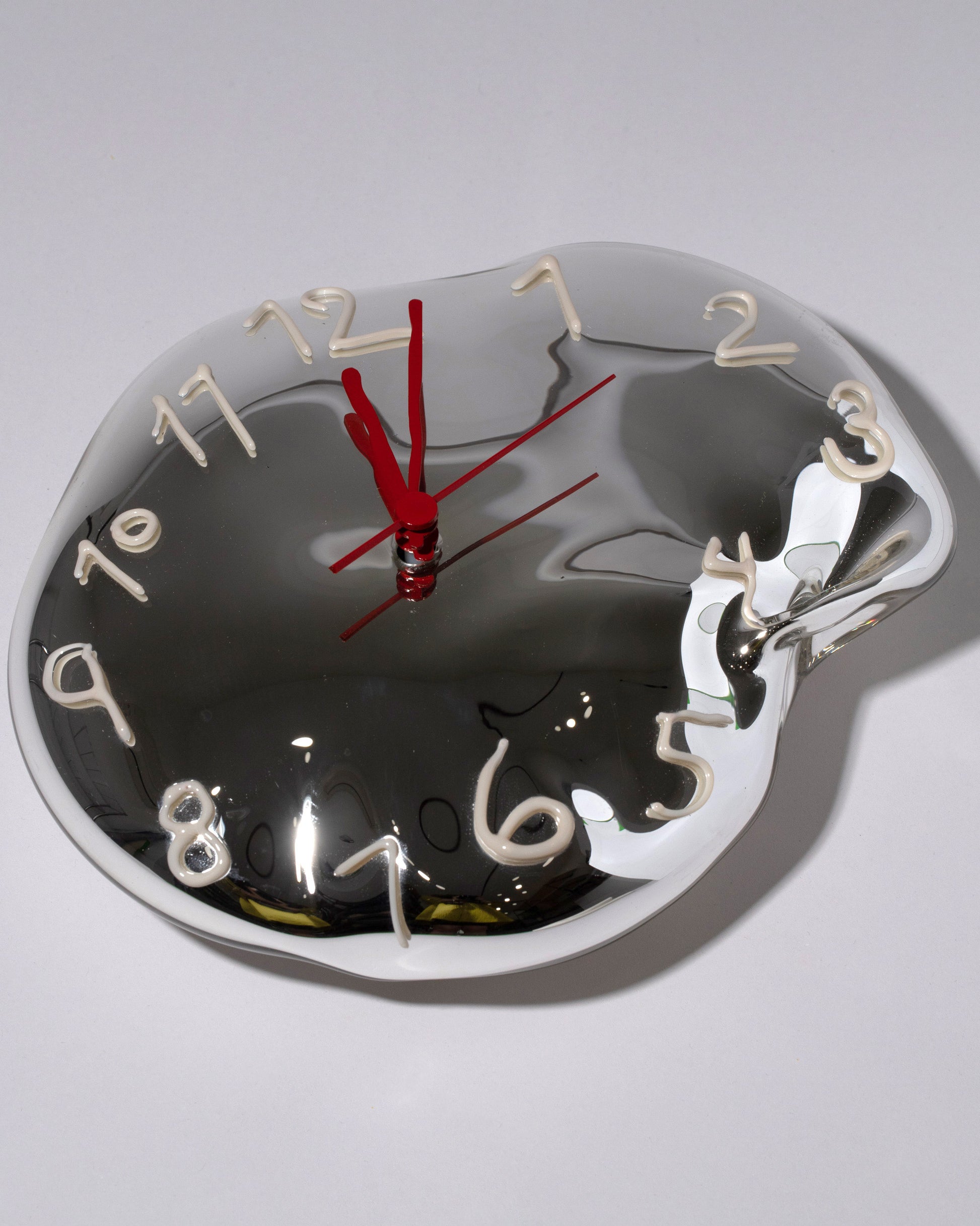 Silje Lindrup Cream Two Glass Wall Clock on light color background.