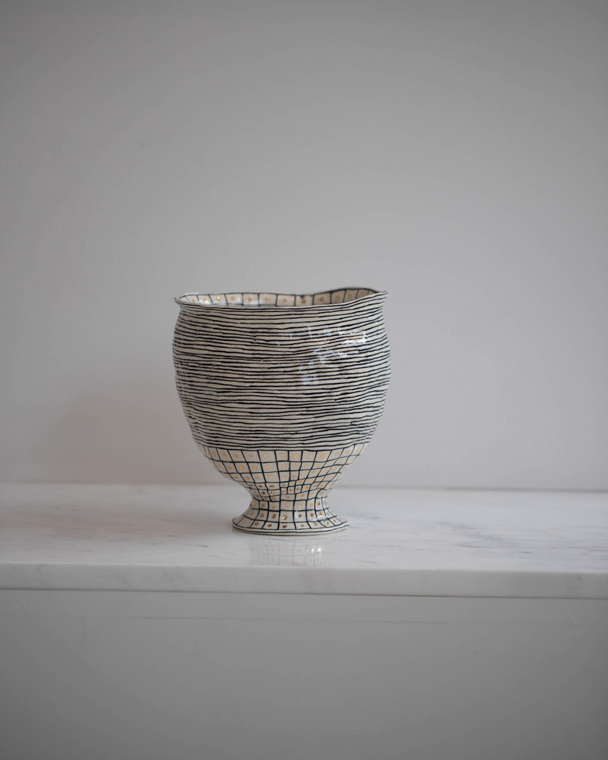 Suzanne Sullivan Premium Design Details Considering Utility Vase on light color background.