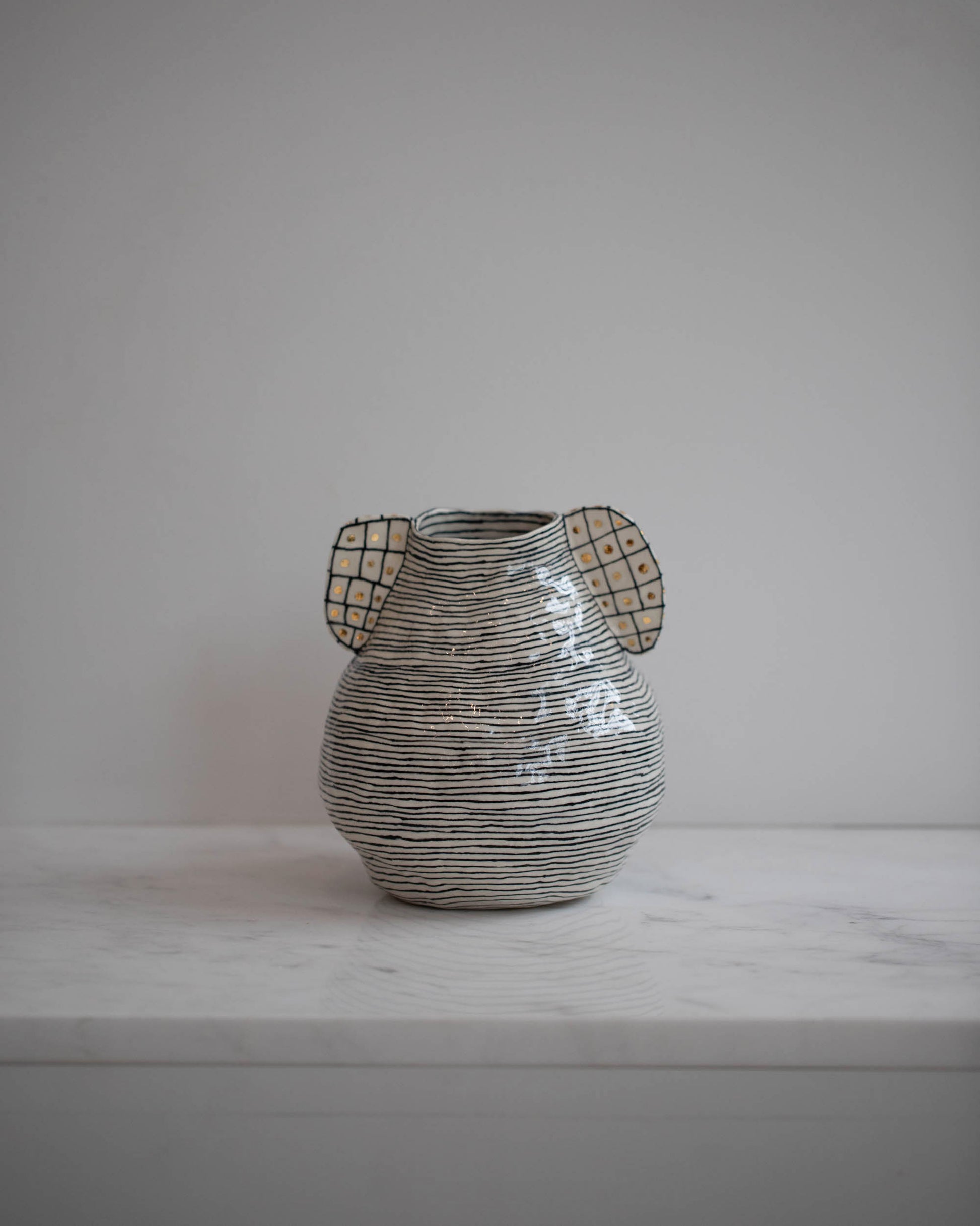Suzanne Sullivan Discover The Range Considering Utility Vase on light color background.