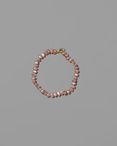 Pink Peony Baroque Pearl Bracelet on light color background.