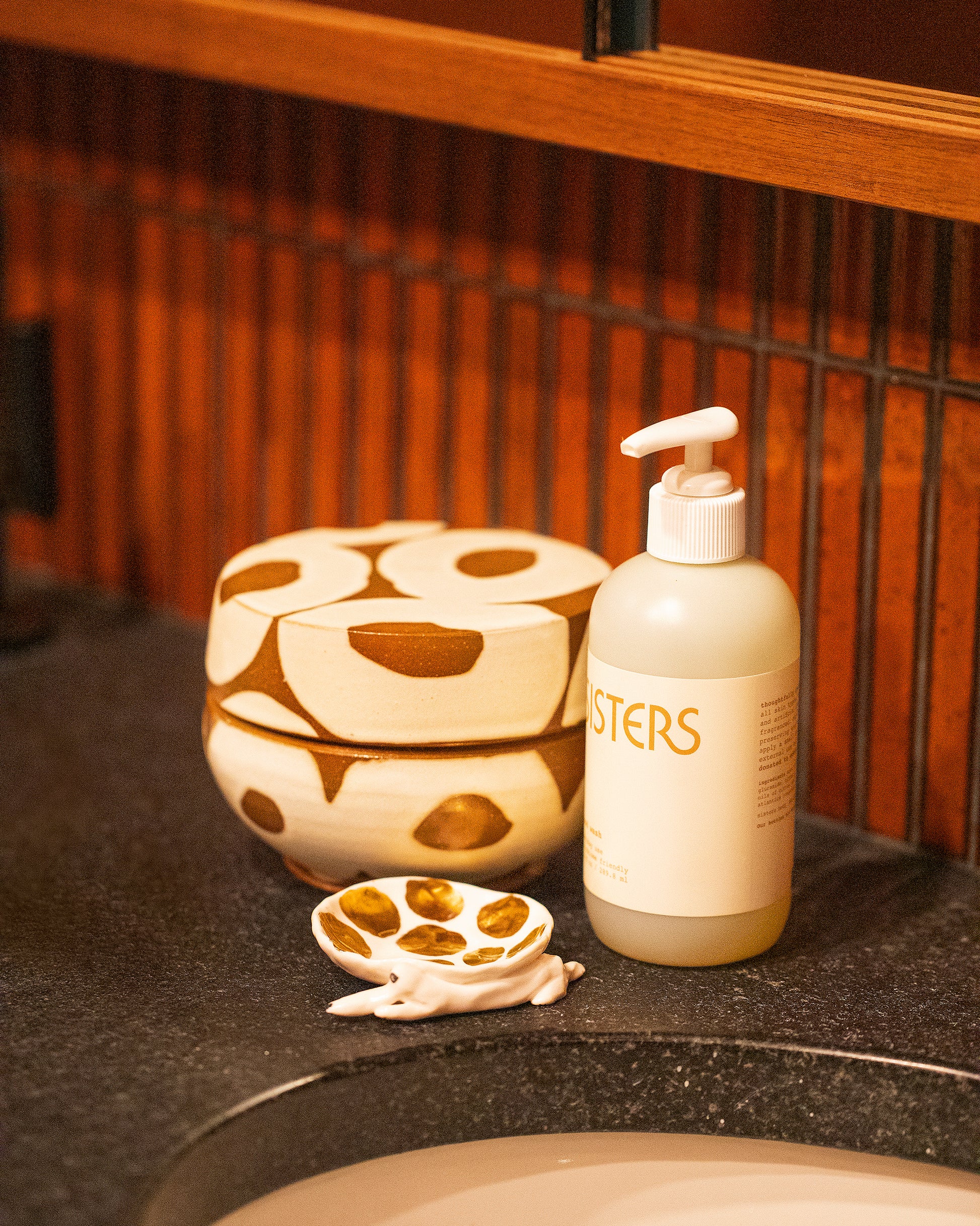 Styled image featuring Jeremy Ayers Circles Salt Box, Sisters Body Hand Wash and Eleonor Boström dish.
