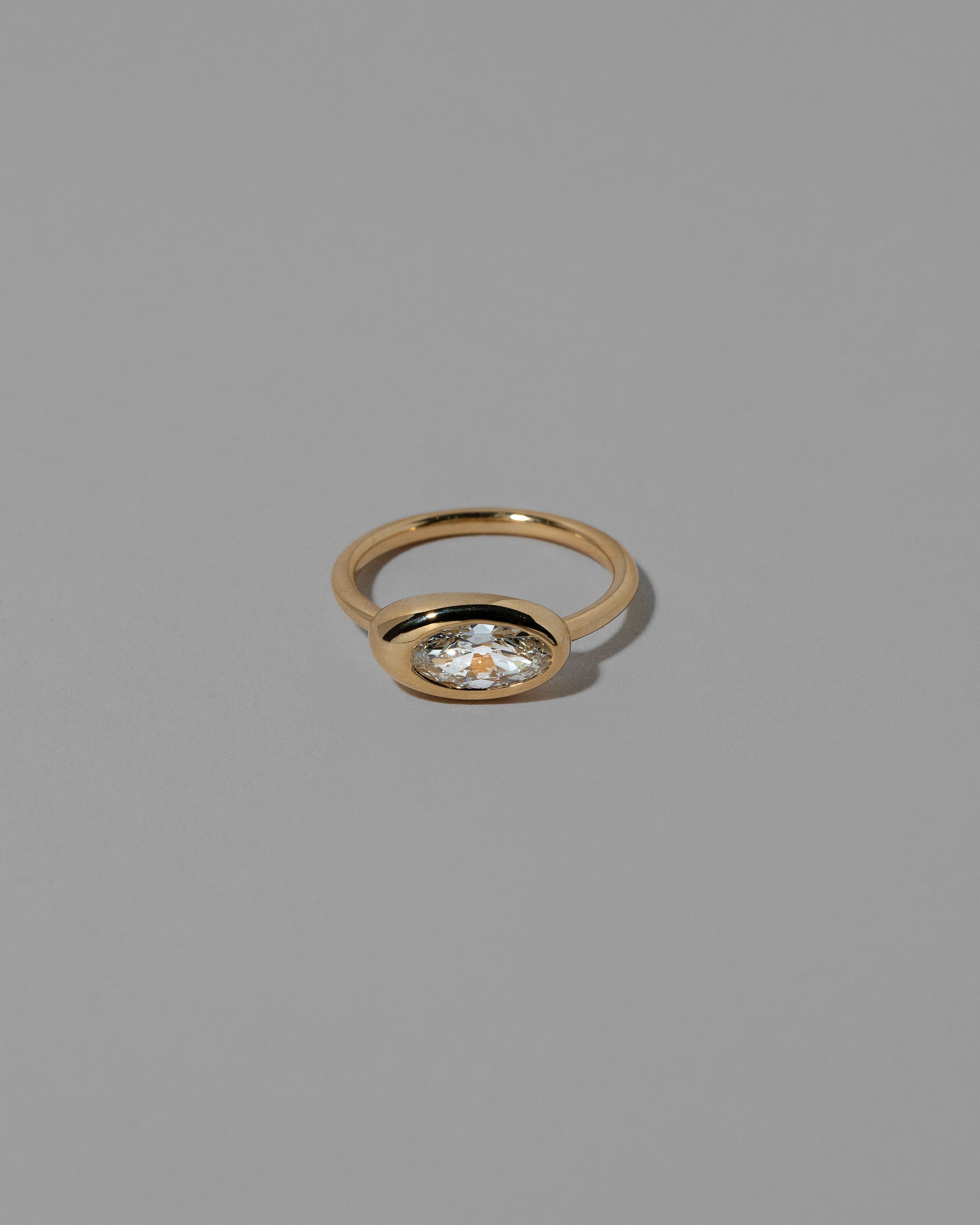 Moval White Diamond Equalize Ring on light color background.