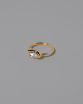 View from the side of the Moval White Diamond Equalize Ring on light color background.