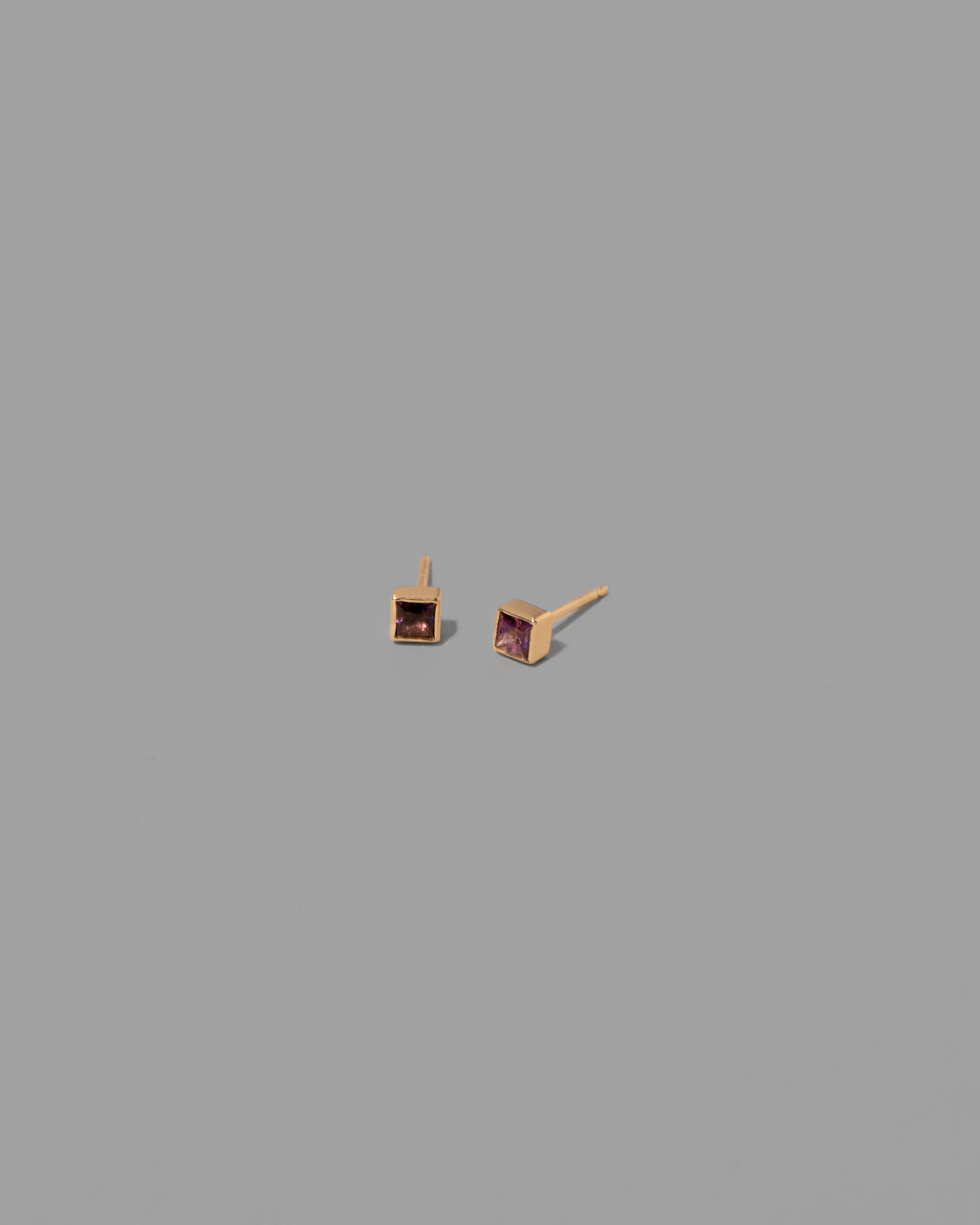 Petite Bicolor Pink/Blue Sapphire Square Frame Earrings on light color background.