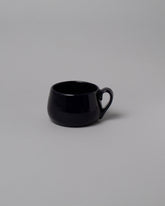 La Ceramica Vincenzo Del Monaco Midnight Round Mug on light color background.