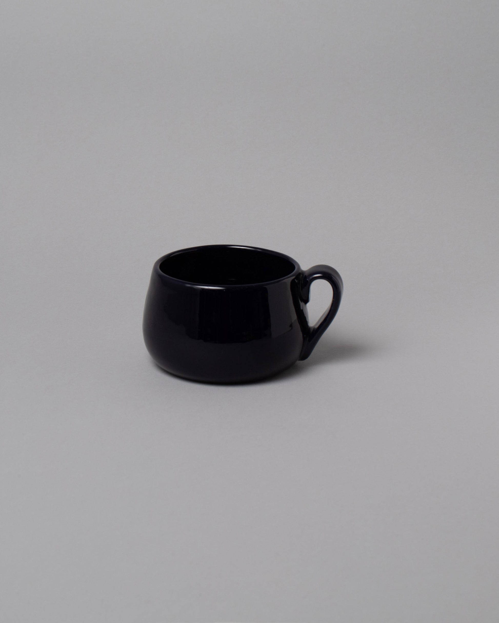 La Ceramica Vincenzo Del Monaco Midnight Round Mug on light color background.