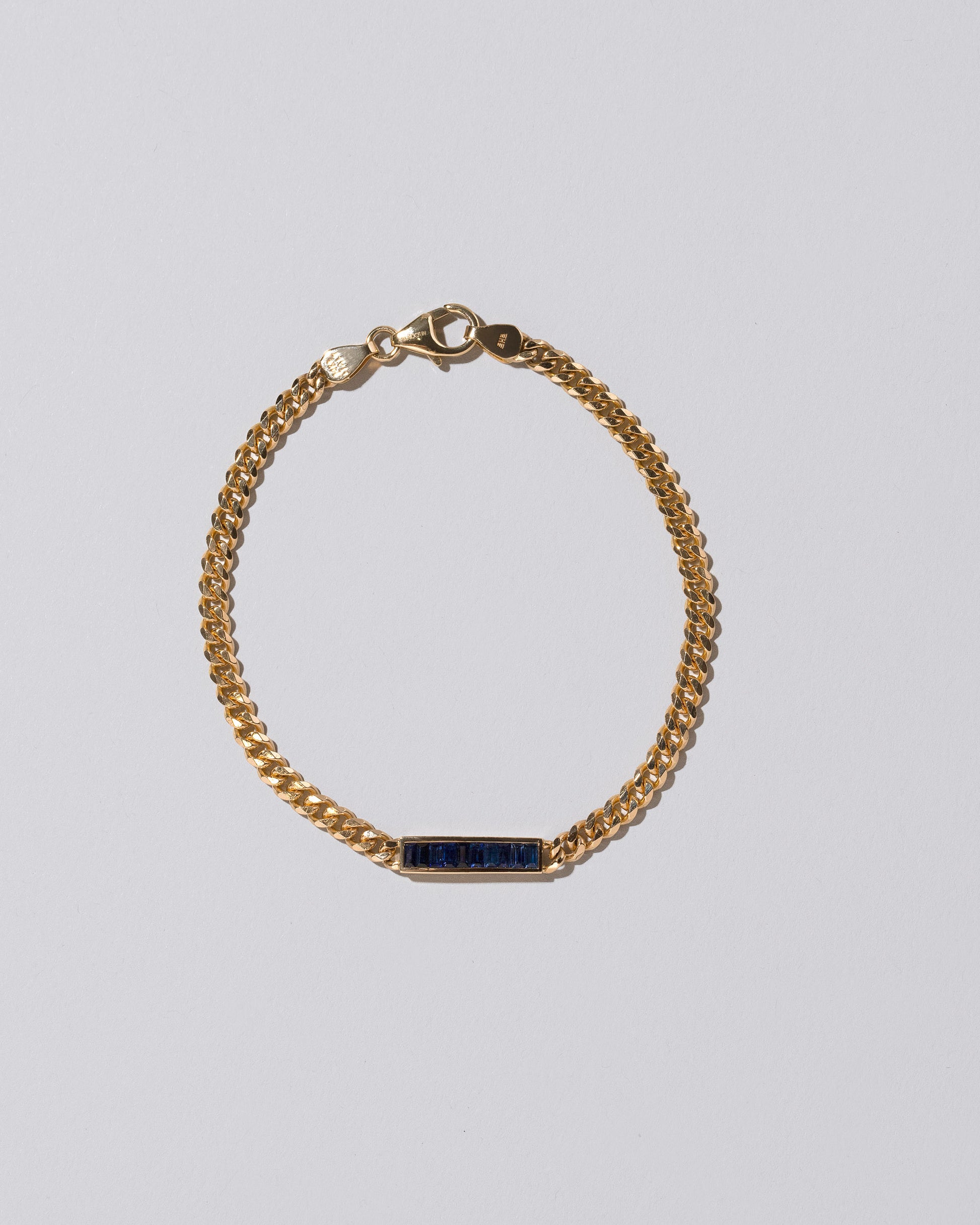 Blue Sapphire 3.4mm Identity Chain Bracelet on light color background.