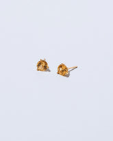 product_hover::Super Yellow Beryl Martini Stud Earrings on light color background.