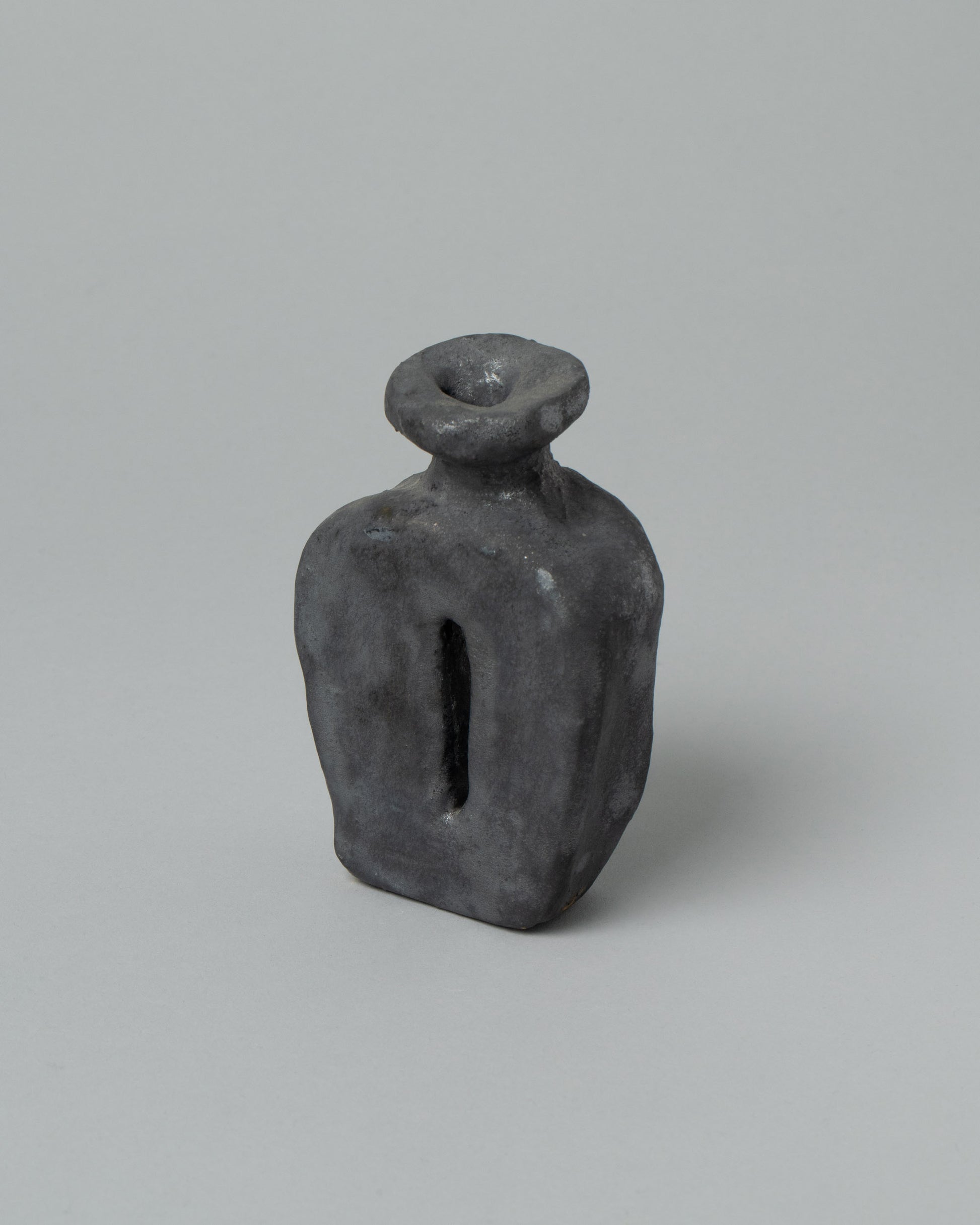Willem van Hooff Matte Charcoal Extra Small Core Sculpture on light color background.