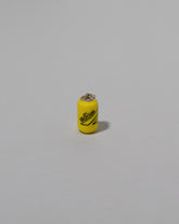 Samples & Imperfects Lemon Soda Can Charm light color background.