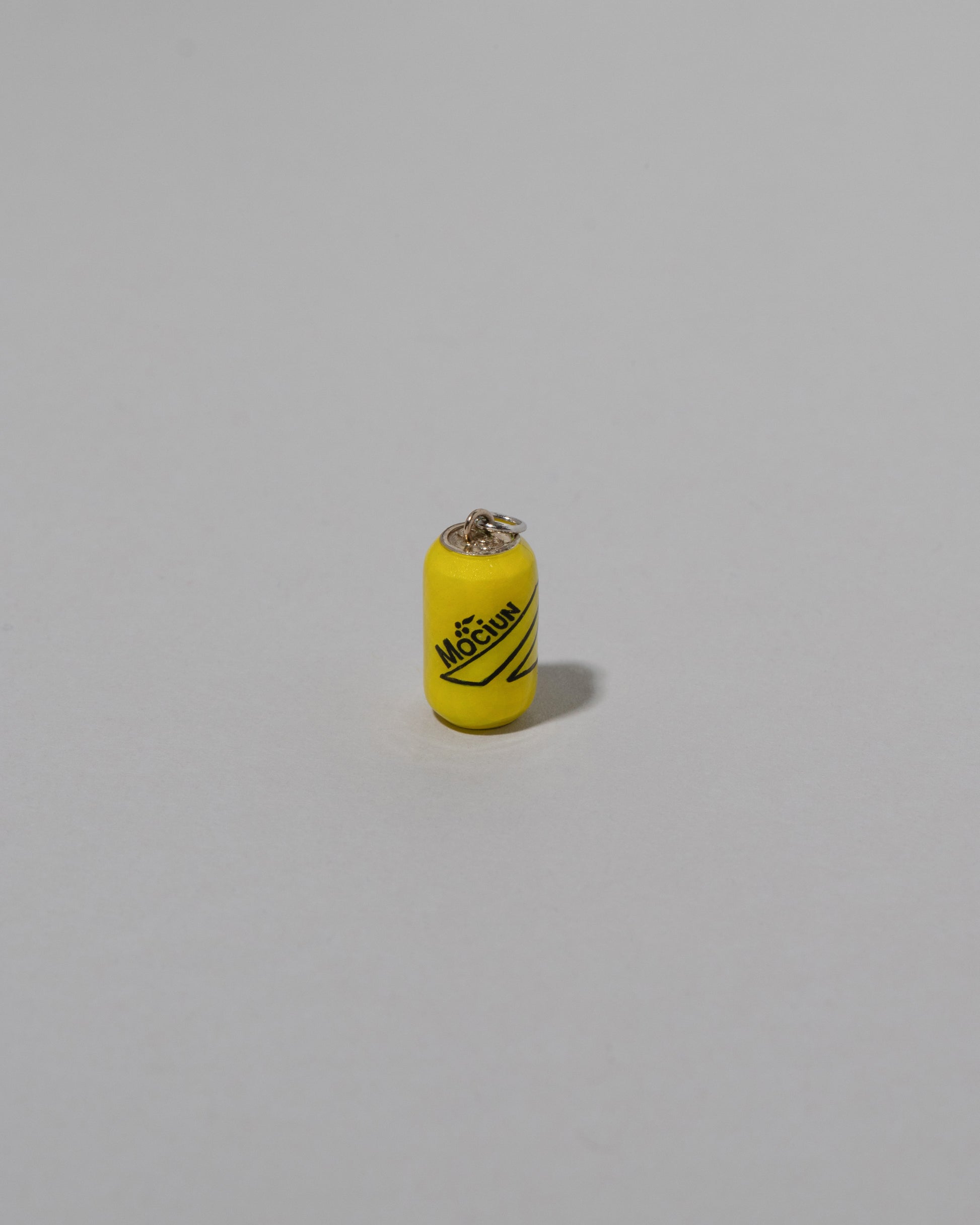 Samples & Imperfects Lemon Soda Can Charm light color background.