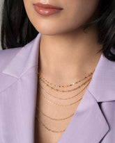 Petite Pinched Loop Chain Necklace on model.