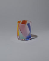 Bow Glassworks Tutti Frutti Splash Cup on light color background.