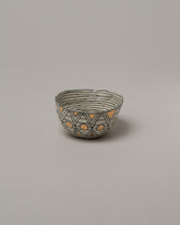 Suzanne Sullivan Seven Pinch Bowl on light color background.