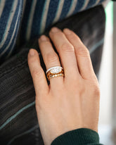 Moonbeam 3mm Enamel Band, Vivacity Ring and Gold One Tier Mimosa Band on model.