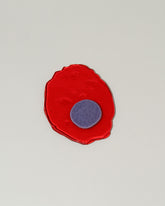 Jonny Campolo Transparent Red For Your Pleasure Amused Boosh Egg on light color background.