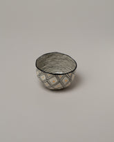 Suzanne Sullivan Three Pinch Bowl on light color background.