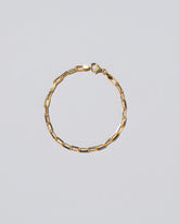 Lightweight Beveled Oval Chain Bracelet on light color background.