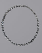 CRZM Sterling Silver Mini Bedrock Necklace on light color background.