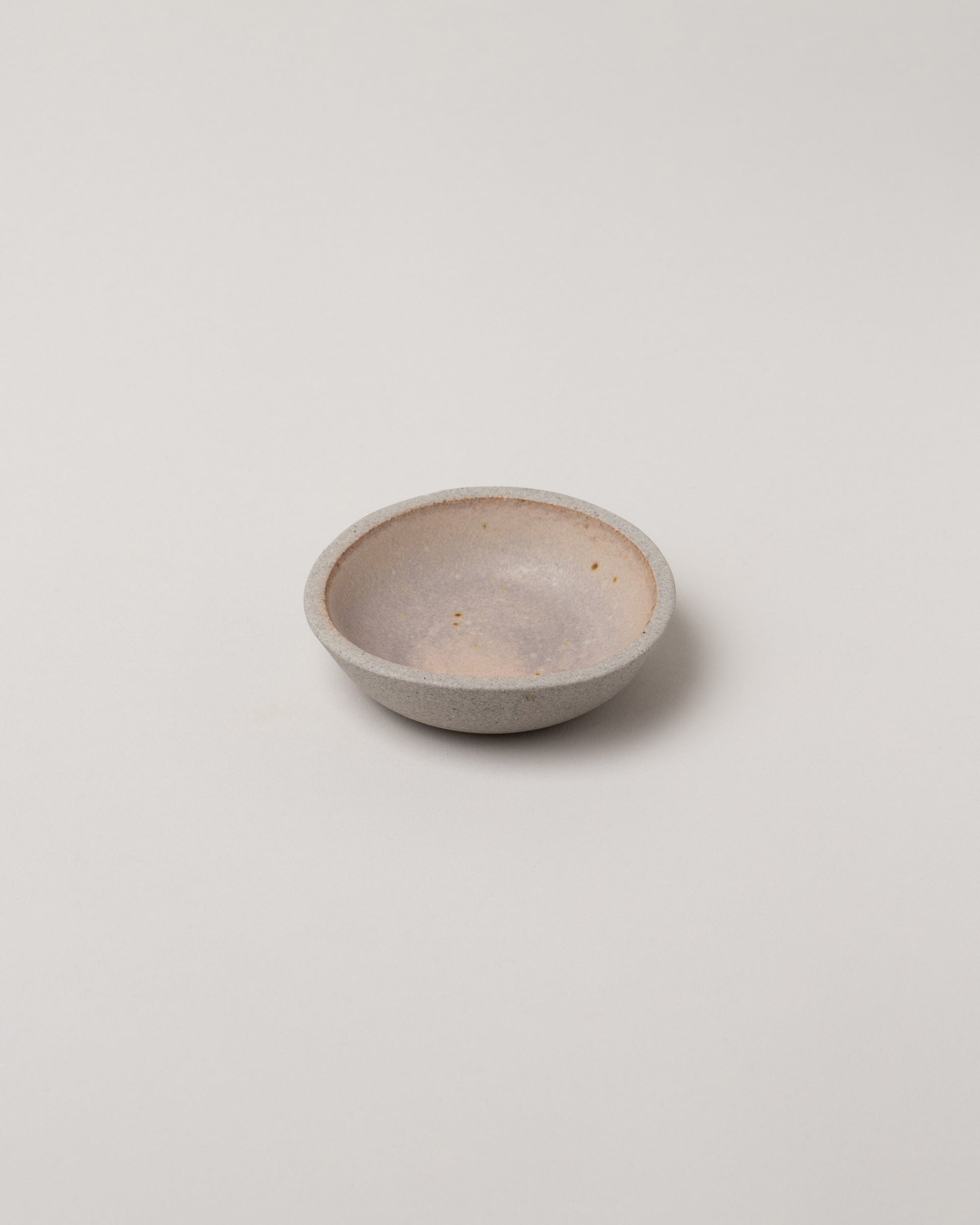 Humble Ceramics Greystone & English Rose Mini Stillness Bowl on light color background.