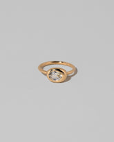 Oval Sapphire Equalize Ring on light color background.