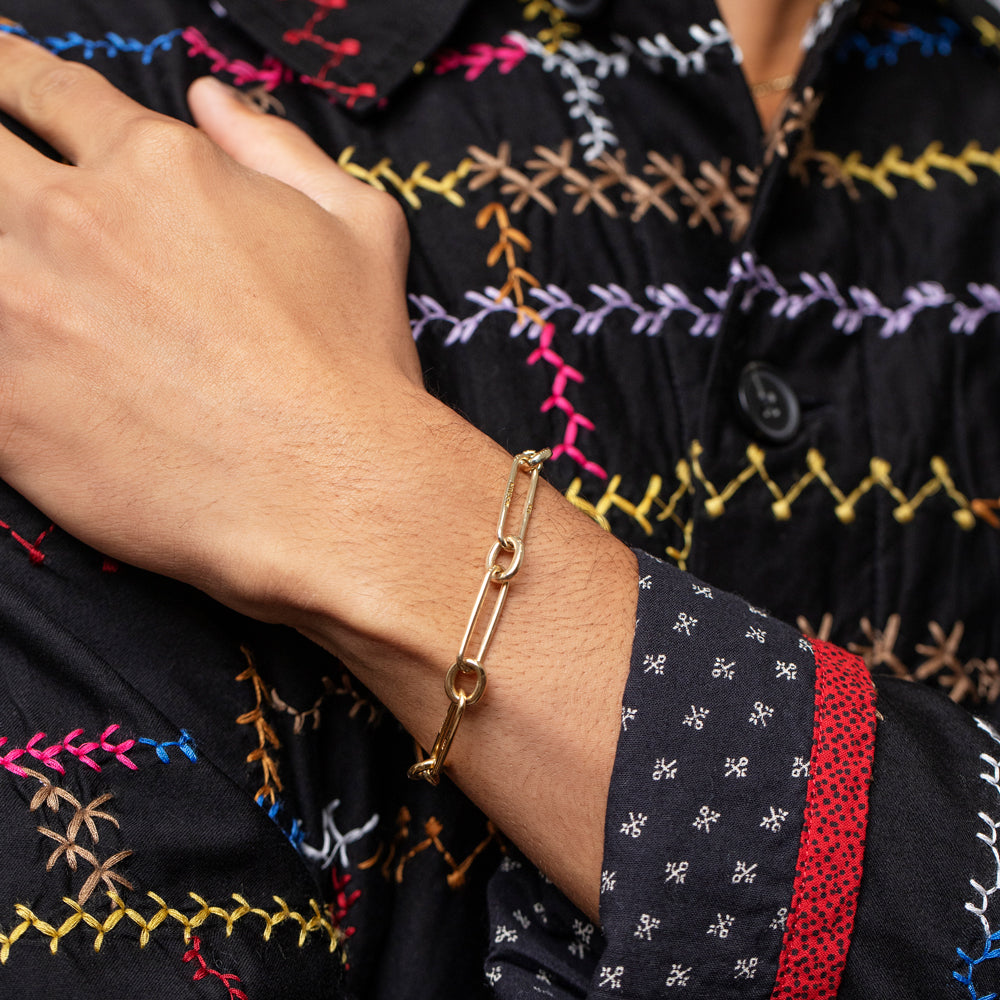product_details::Link Bracelet on male model.