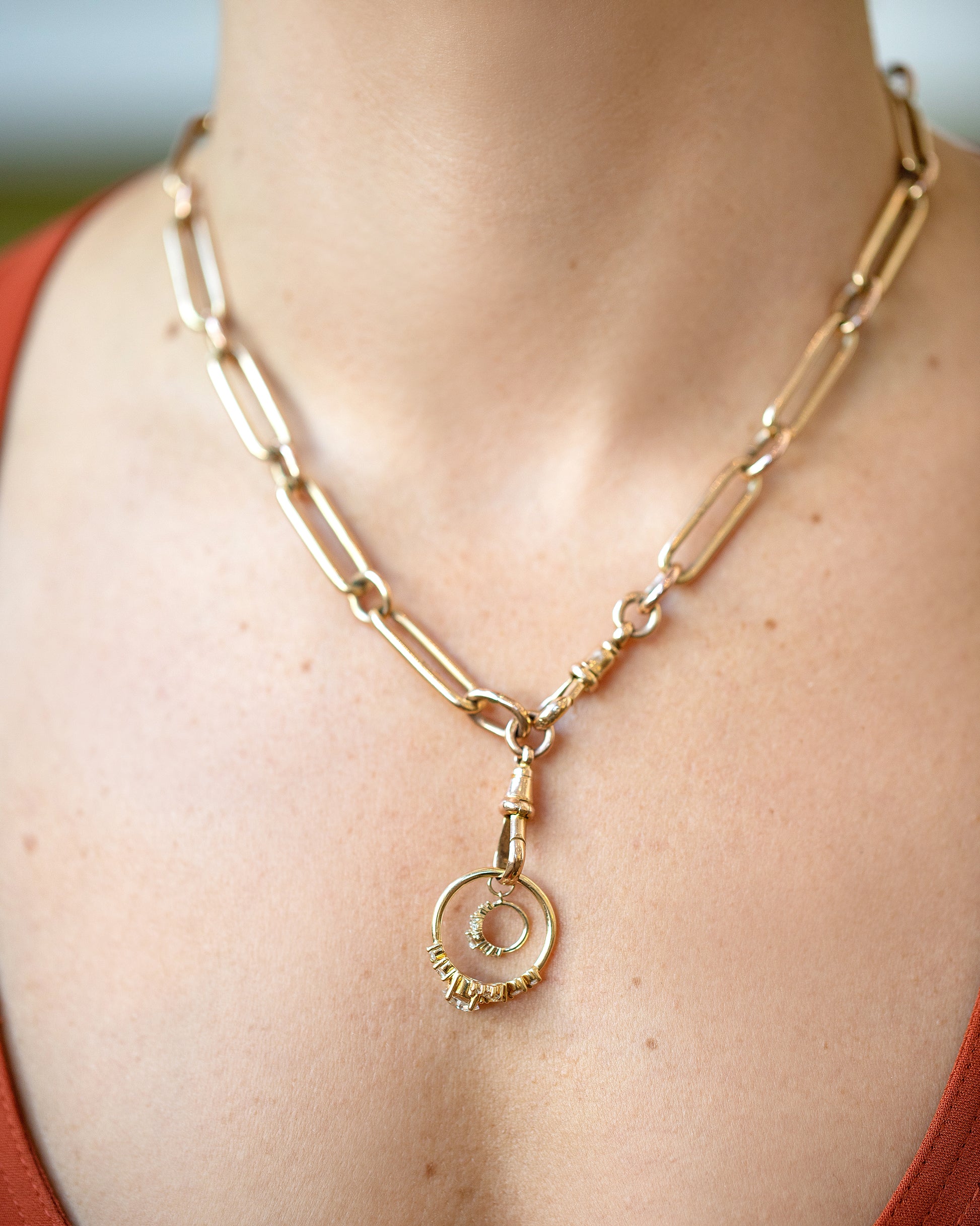 Diamond Luna Ring and Luna Ring Charm paired with the Grand Swivel Fob and Link Necklace on model.