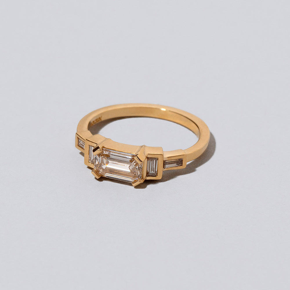 product_details::Closeup details of the Champagne Diamond Expression Ring on light color background.