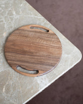 Styled image featuring the Lucas Castex No. 08 Hand-Carved Walnut Wood Serving Board.