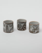 Maggie Boyd Shino Tea Bowls on light color background.