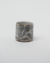 Maggie Boyd One Shino Tea Bowl on light color background.