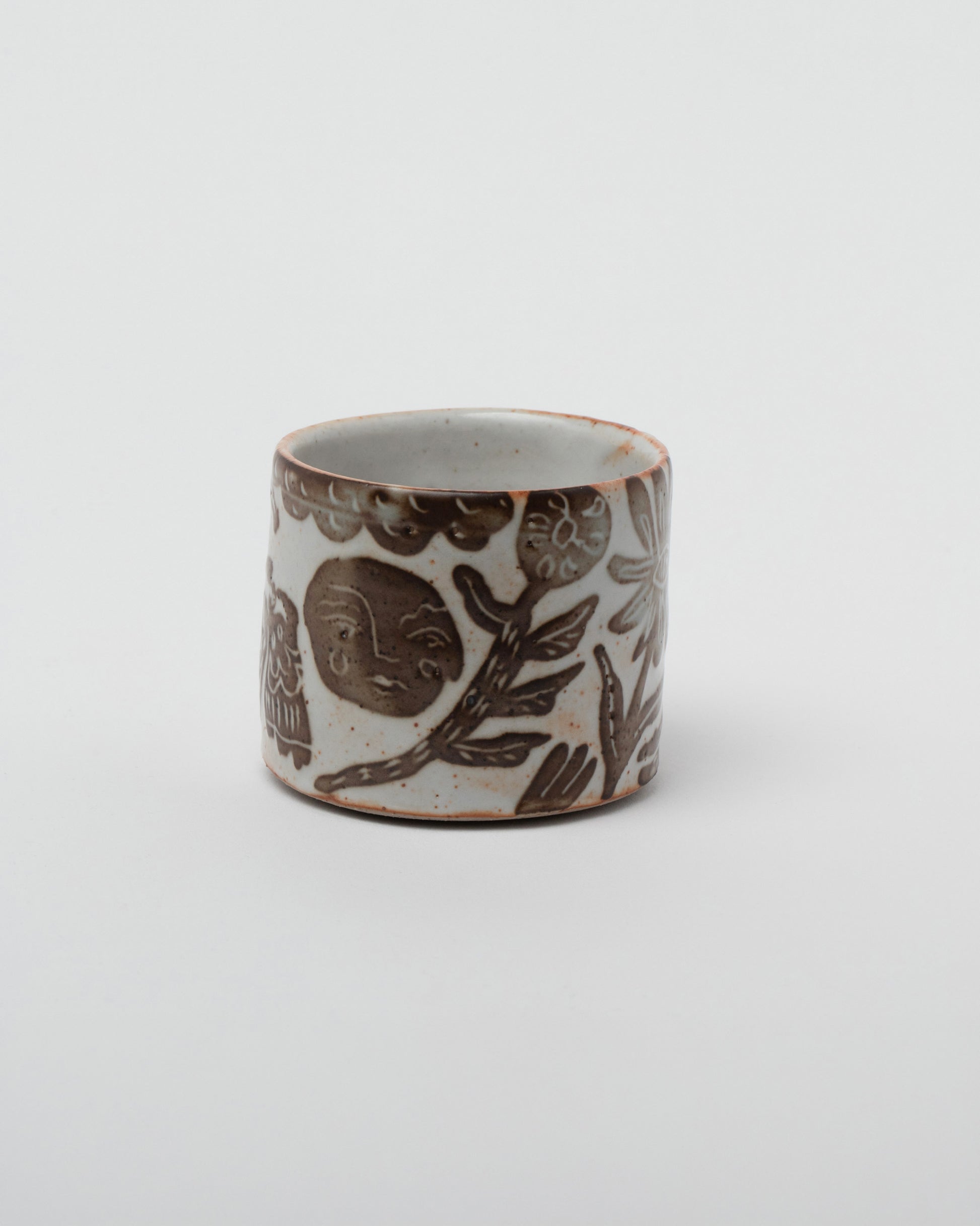 Maggie Boyd Three Shino Tea Bowl on light color background.
