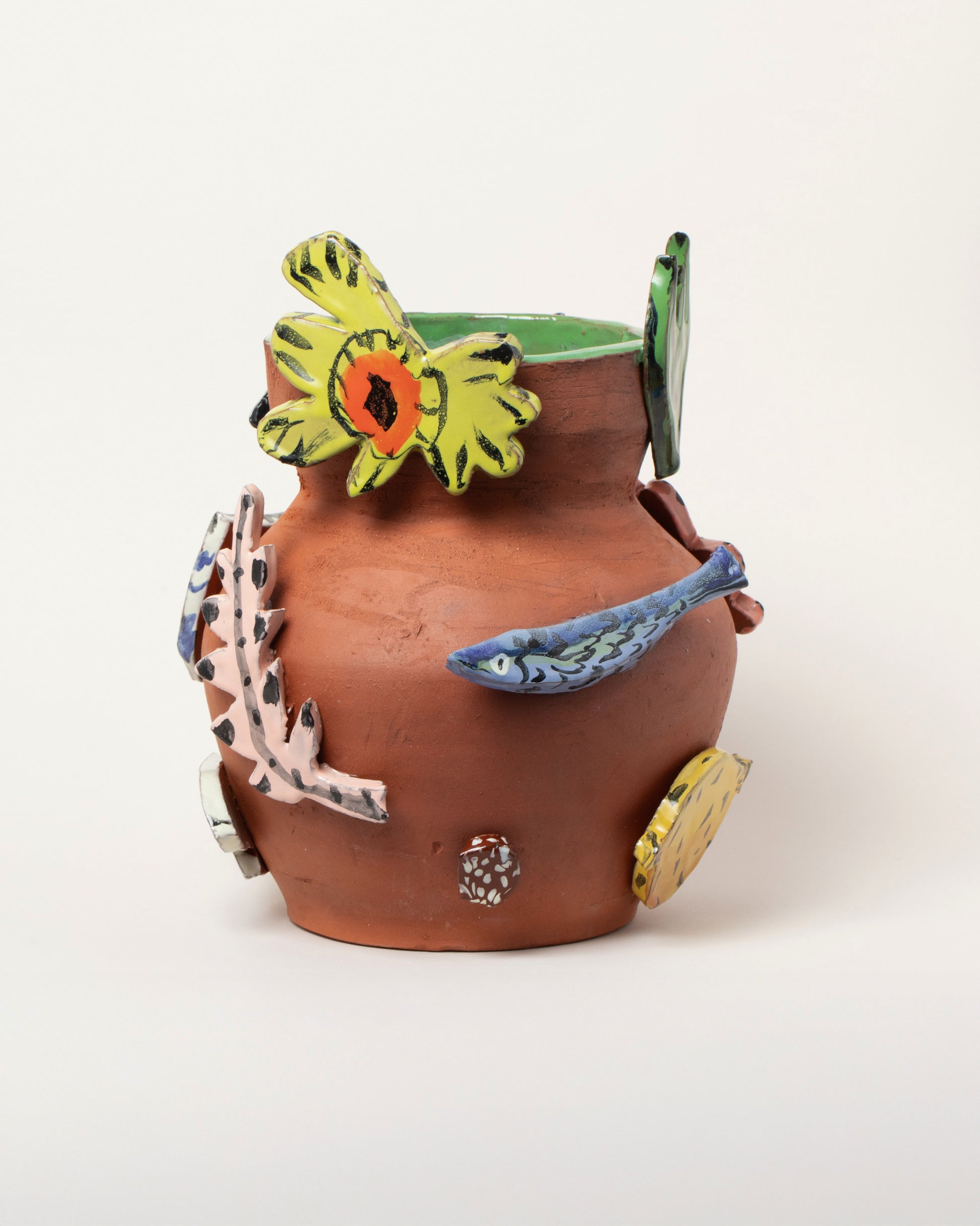 Maggie Boyd Large Cut Out Vase on light color background.