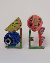 Maggie Boyd Set of Two Bookends on light color background.