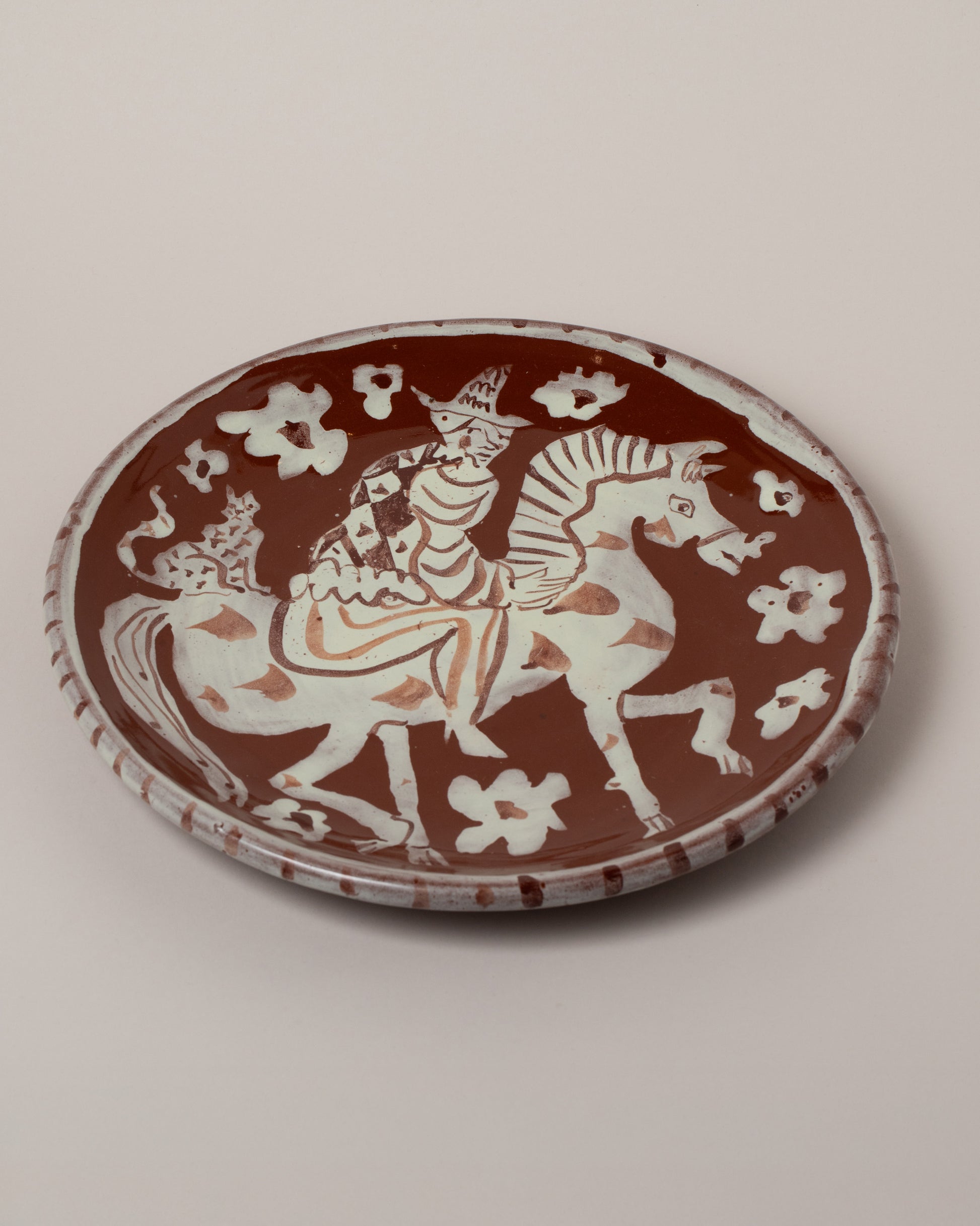 Maggie Boyd Lady Escorting The Cat Platter on light color background.