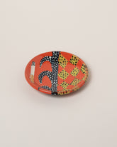 Maggie Boyd One Red Red Hot Small Side Plate on light color background.