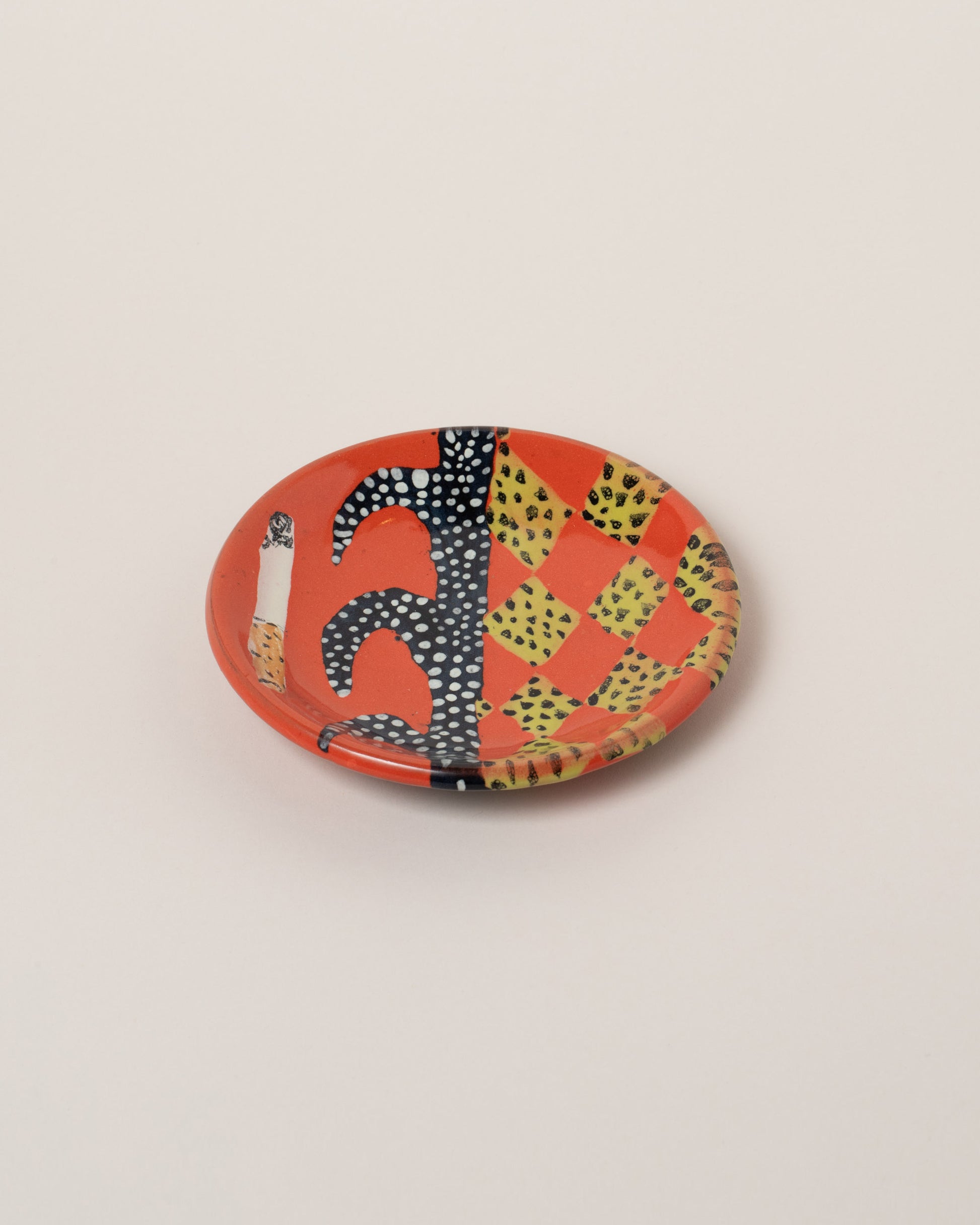 Maggie Boyd One Red Red Hot Small Side Plate on light color background.