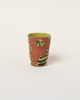 Maggie Boyd Three Chartreuse & Black Figure Tumbler on light color background.