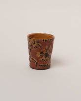 Maggie Boyd Ambrosia One Clay Flower Tumbler on light color background.