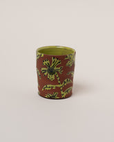 Maggie Boyd Chartreuse Two Clay Flower Tumbler on light color background.